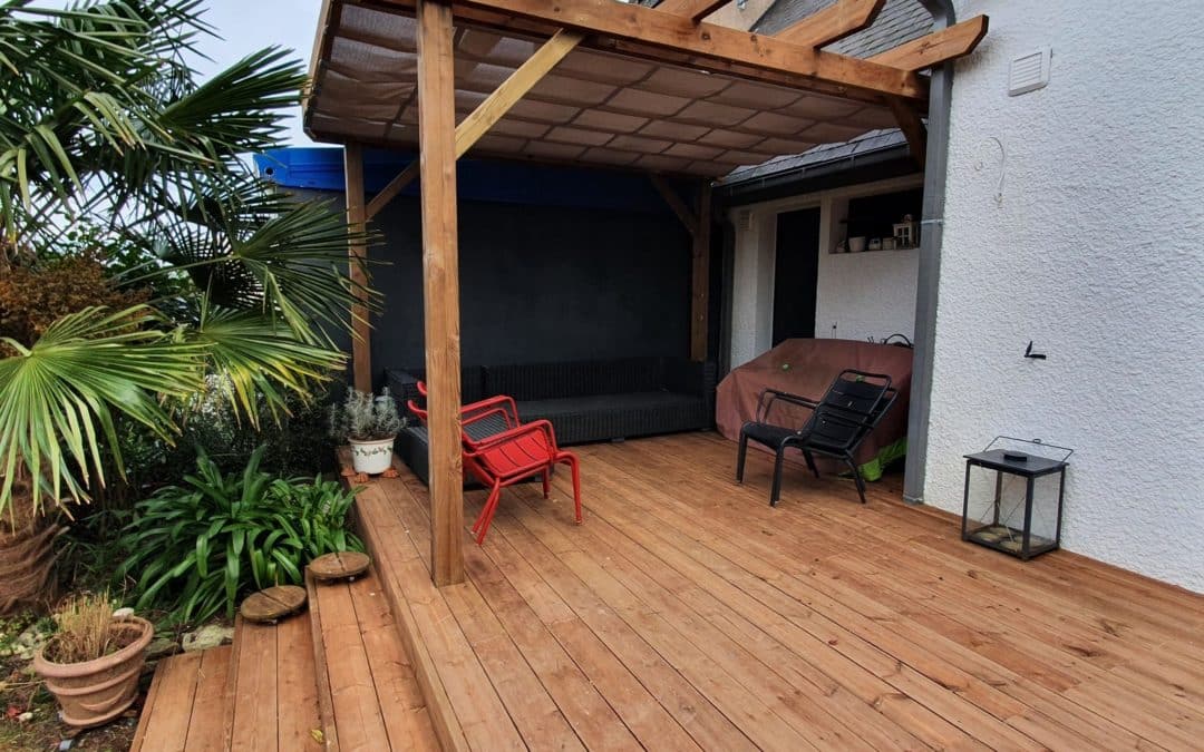 Réalisation d’une terrasse et d’une pergola avec t…